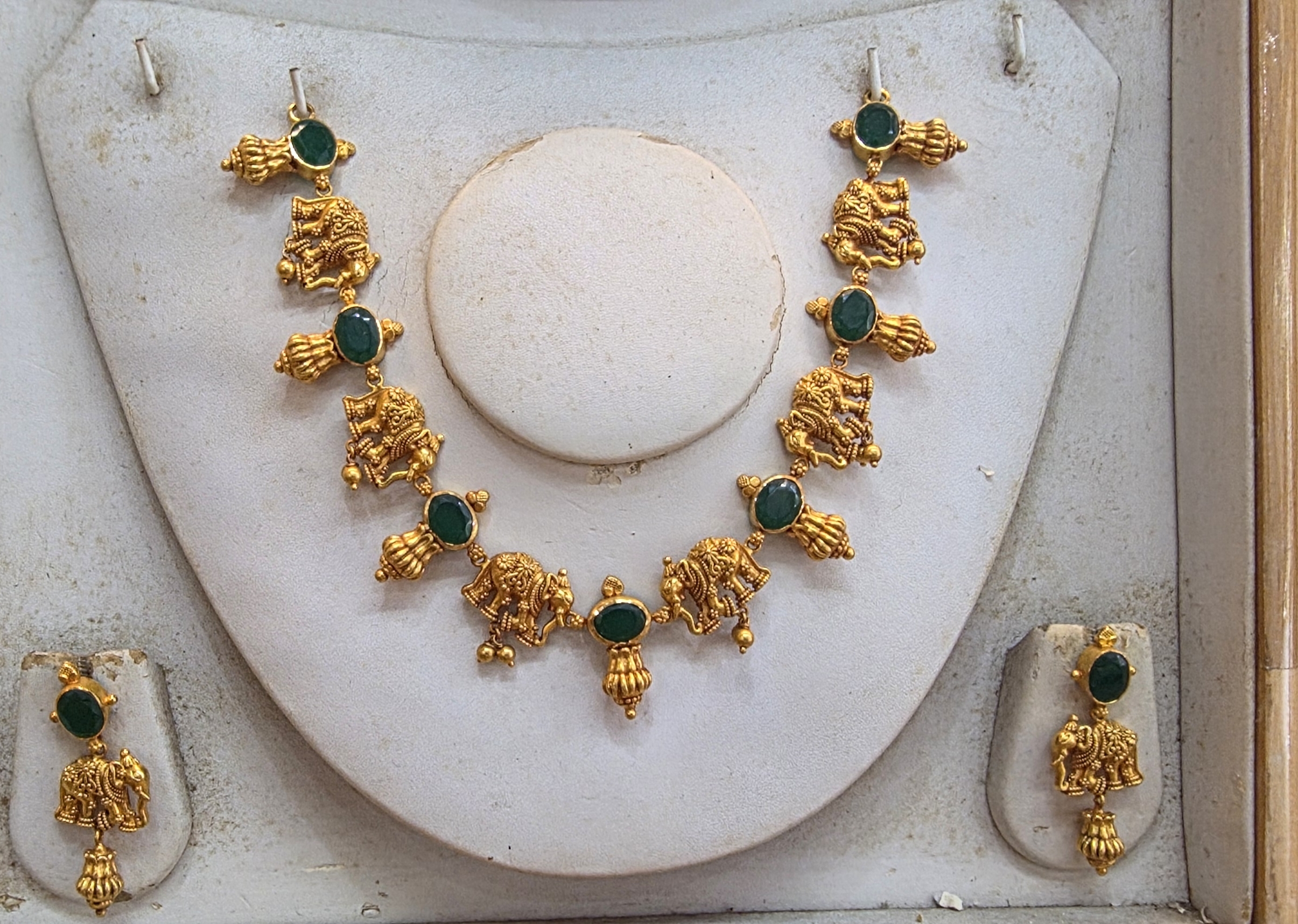 Gold Necklace Embedded With Natural Emeralds With A Unique Temple Jewellery Based On Elephants view 2
