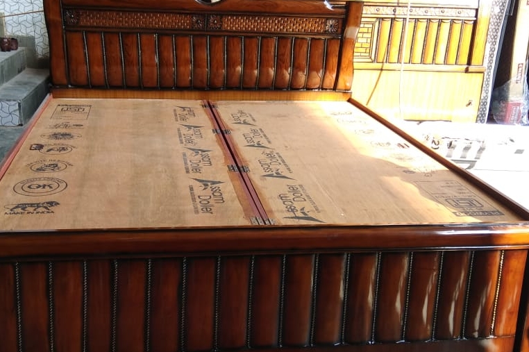 Expertly Crafted Wooden Bed view 2