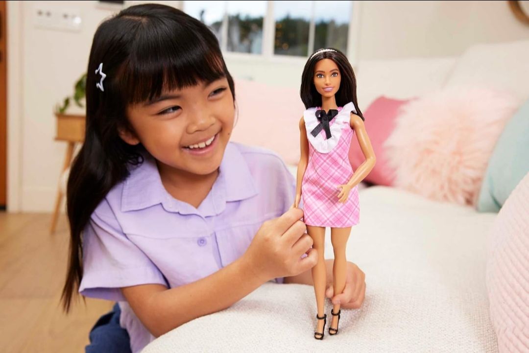 Barbie® Fashionistas™ Doll #209 with Black Hair Wearing a Pink Plaid Dress, Pearlescent Headband and Strappy Heels view 3