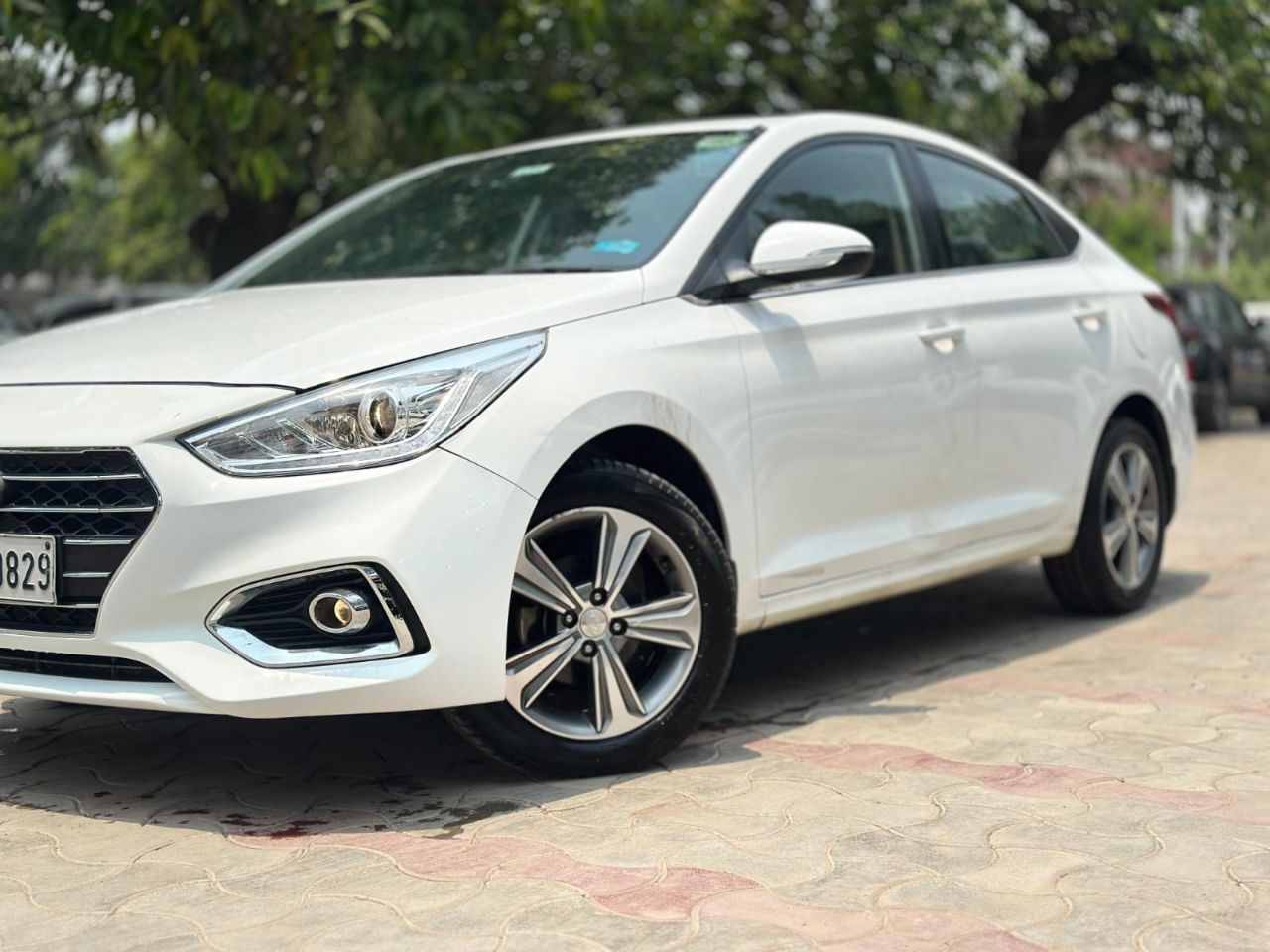 White Sedan Car Rental