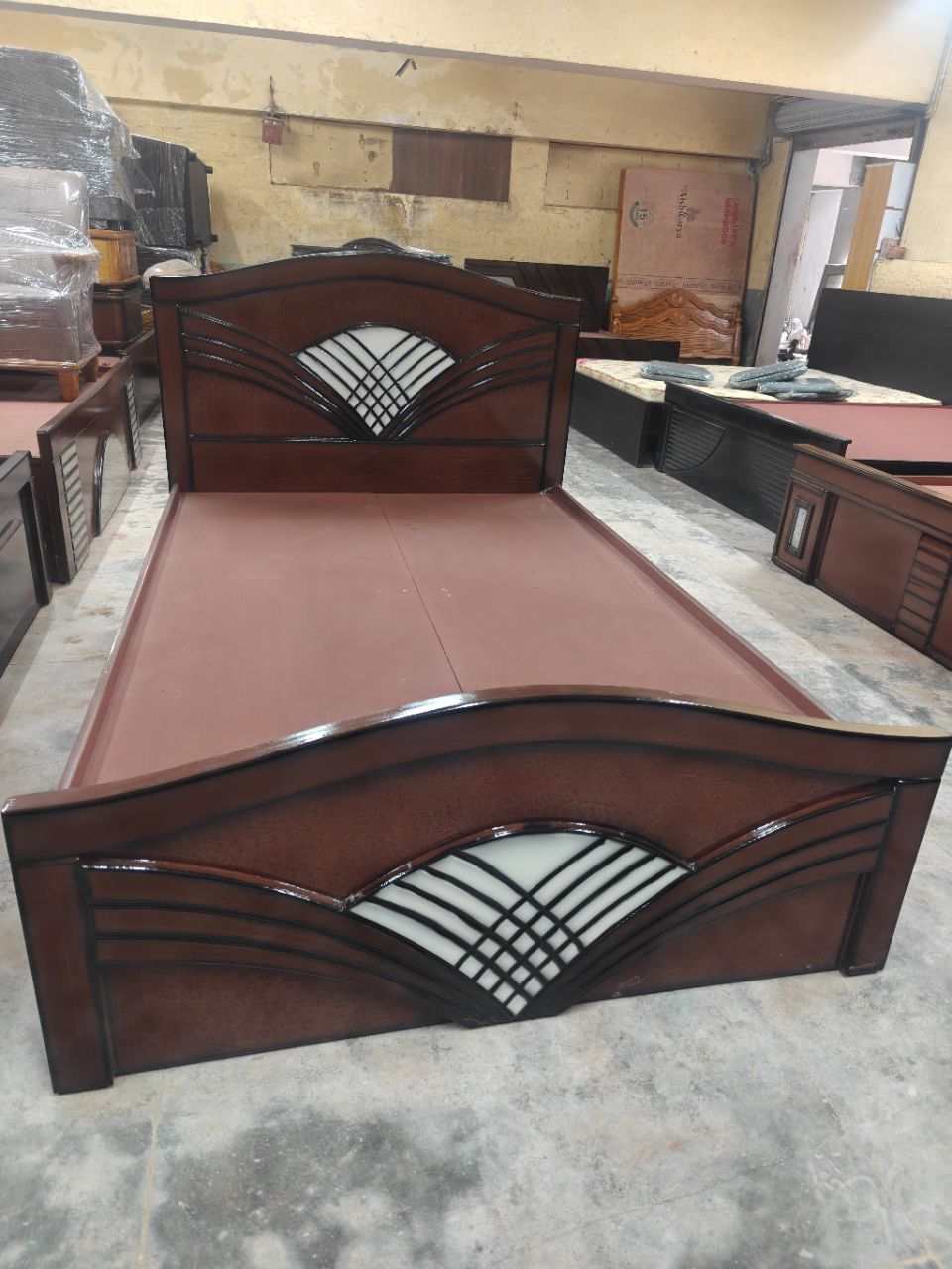 Wooden Bed with Decorative Headboard