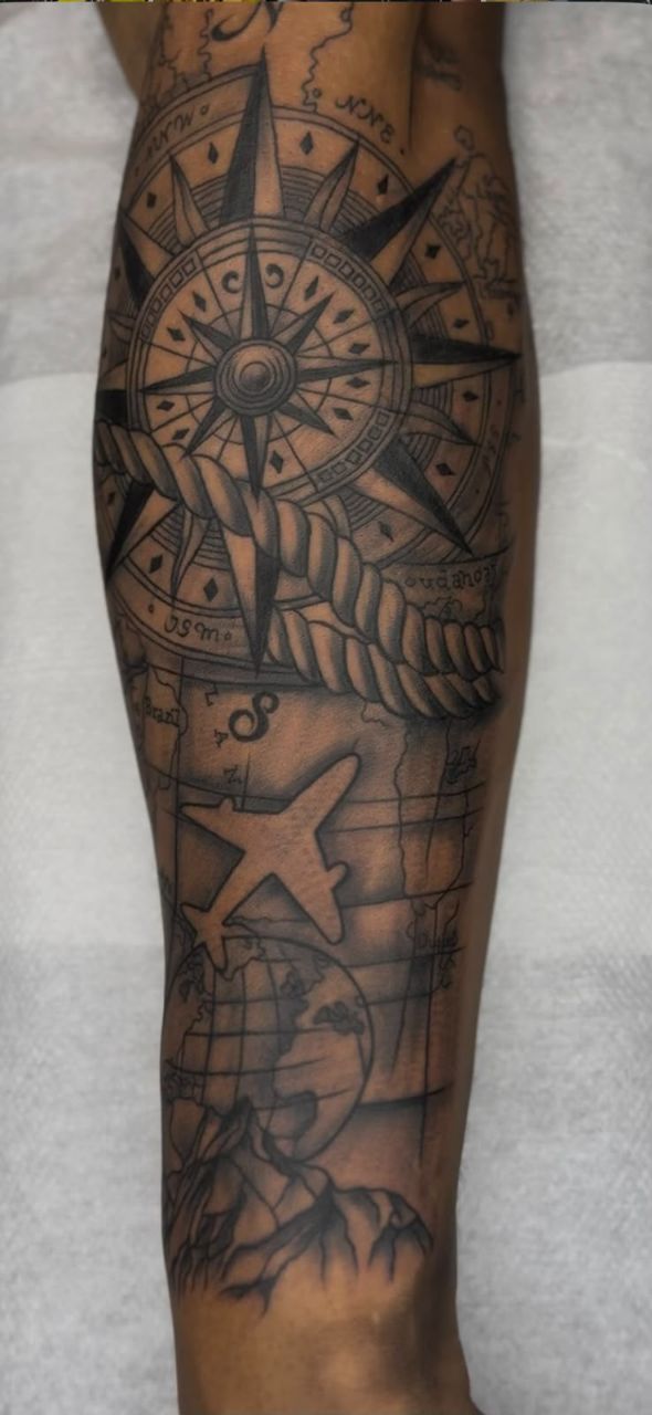 Compass and Airplane Tattoo