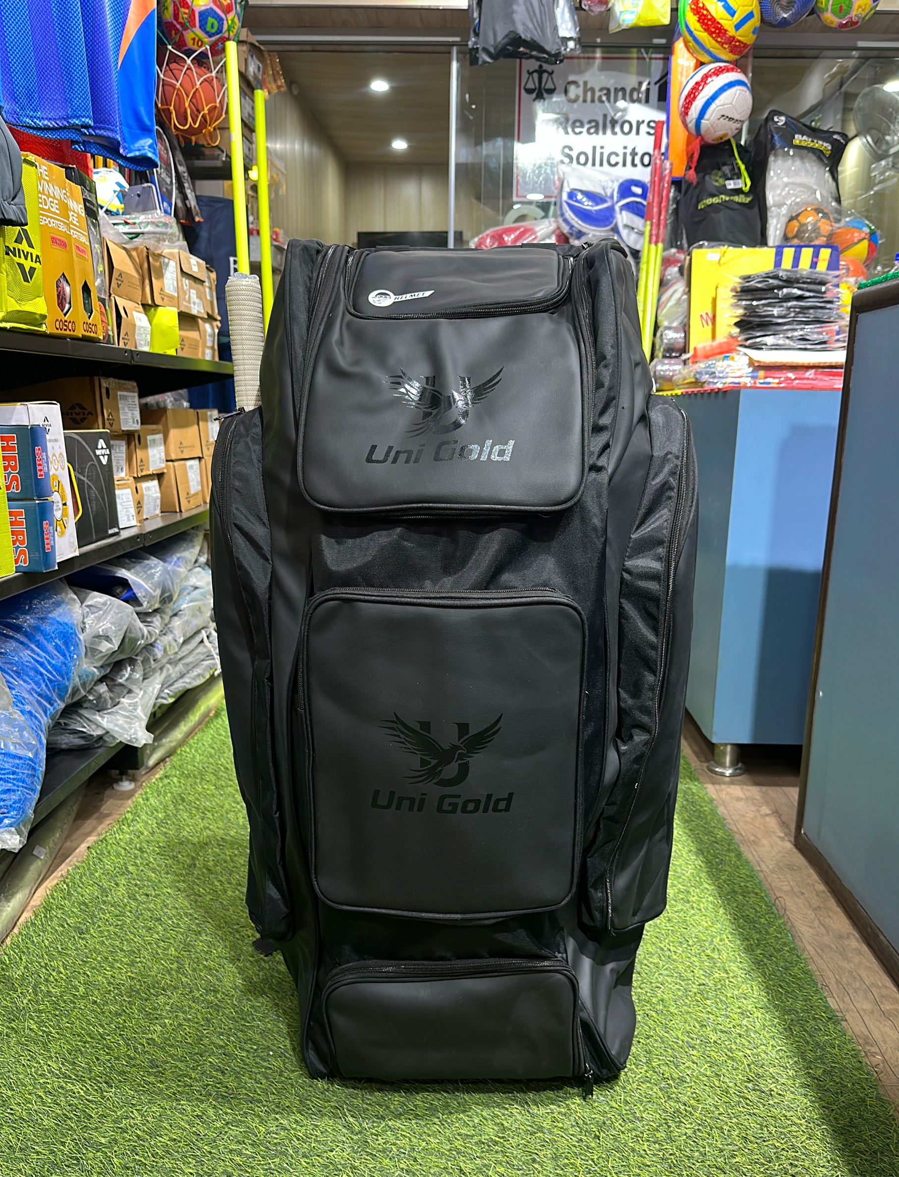 Uni Gold Cricket Kit Bag with two wheels view 2